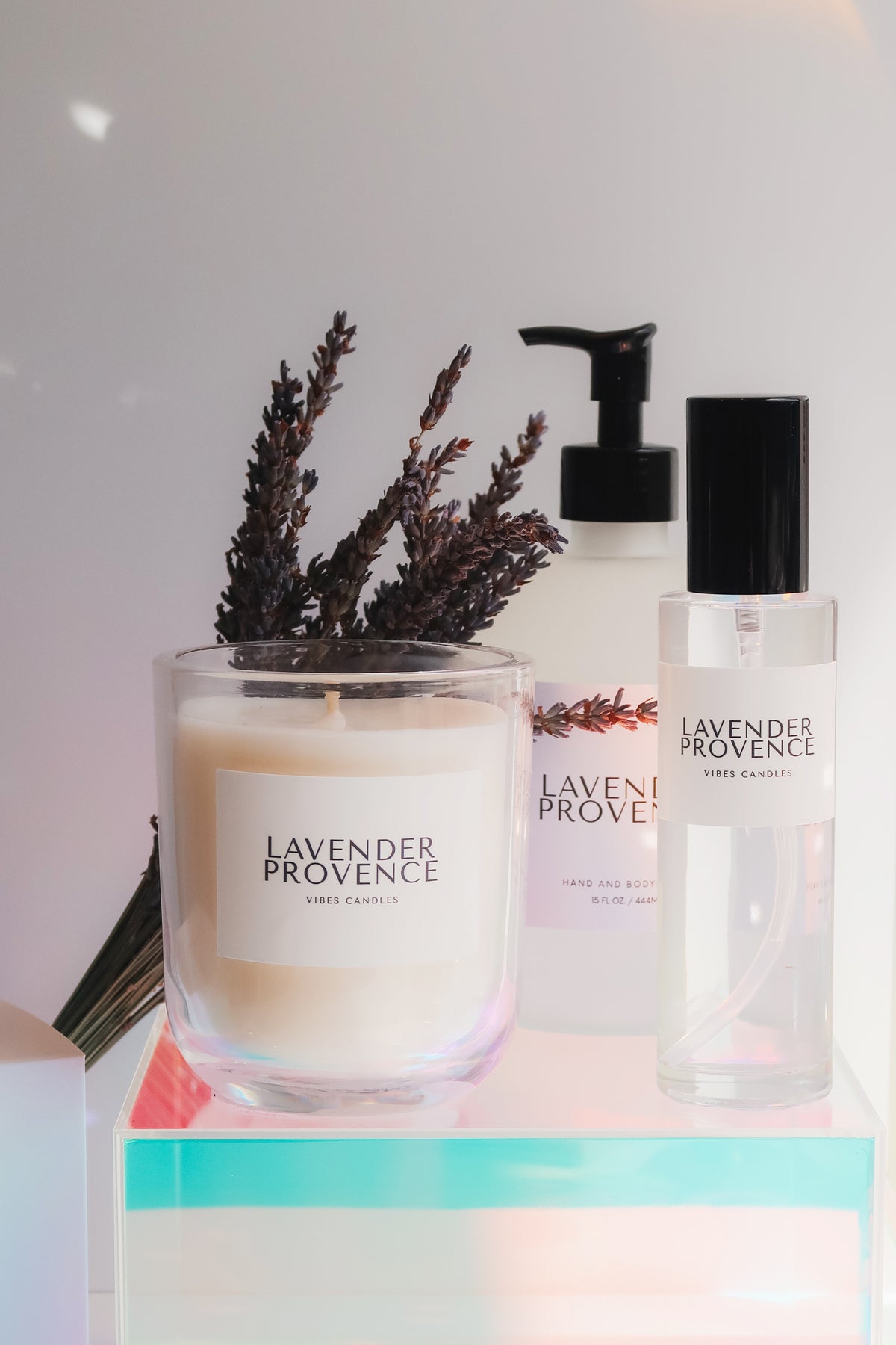 Lavender Provence candle, hand and body wash, room spray and diffuser on a white background